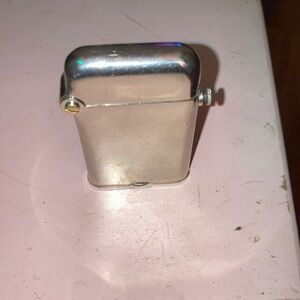 Antique Thorens single claw lighter.